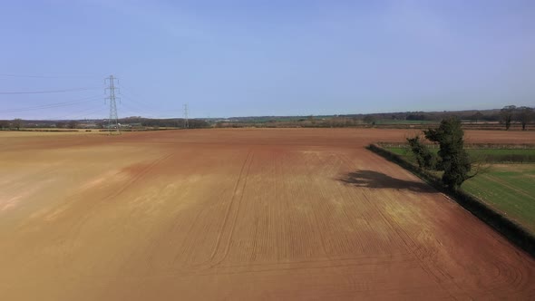 Aerial photo of a beautiful farmers field in the spring time in the town of Wetherby in Leeds