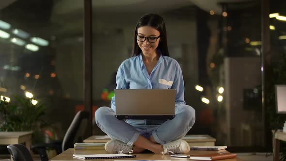 Girl Happy With Work Done Closing Laptop, Successful Completion of Project