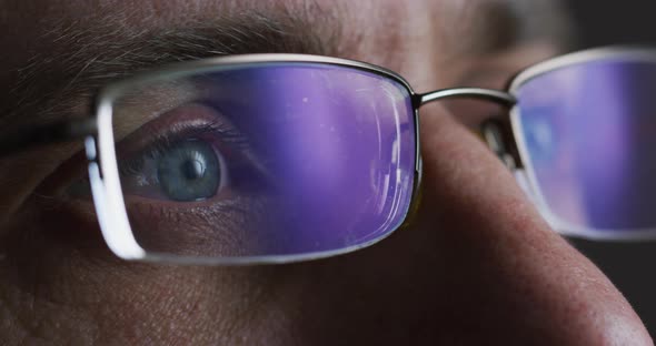 Man with blue eyes wearing glasses