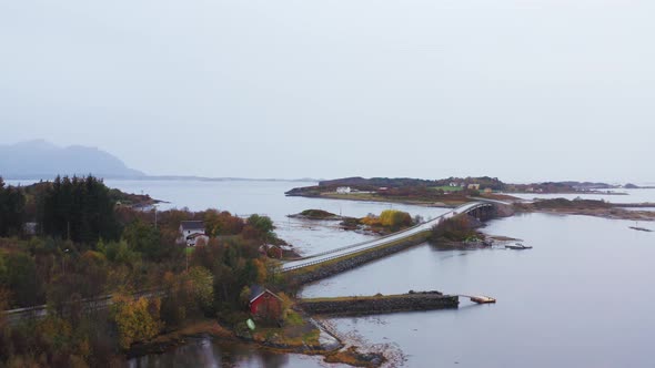 Famous Atlantic Ocean Road On A Foggy Day With Island In More og Romsdal, Norway. - aerial