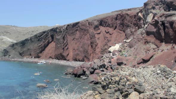 Wide shot of the red beach in Santorini.