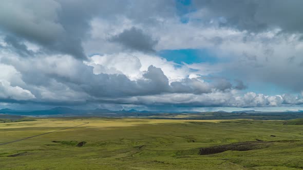 Clouds Move Over the Mountains and Plain in Iceland