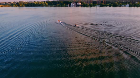 Motor ship sails on river. High speed boat moving on lake