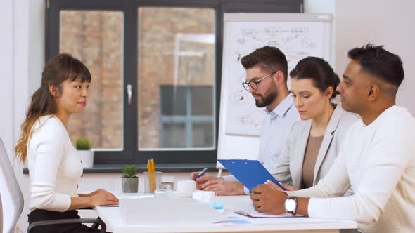 Recruiters Having Interview with Employee