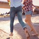 Carefree Couple in Love Running Barefoot on Beach - VideoHive Item for Sale