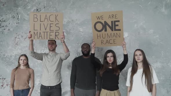 Peaceful Activists Holding Cardboard Banners "Black Lives Matter"