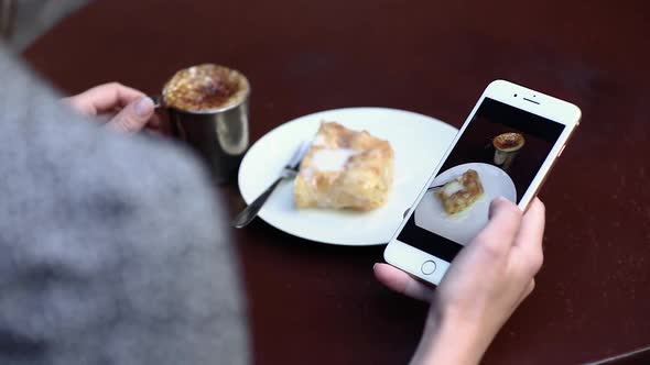 Food Photography. Woman At Cafe Watching Photos On Phone Closeup