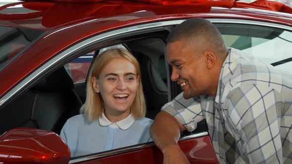 Cheerful Young Couple Buying New Automobile 1080p