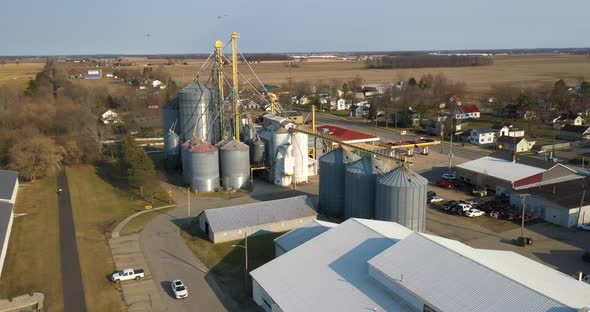 Grain elevator in Fowler Michigan with drone video pulling out.
