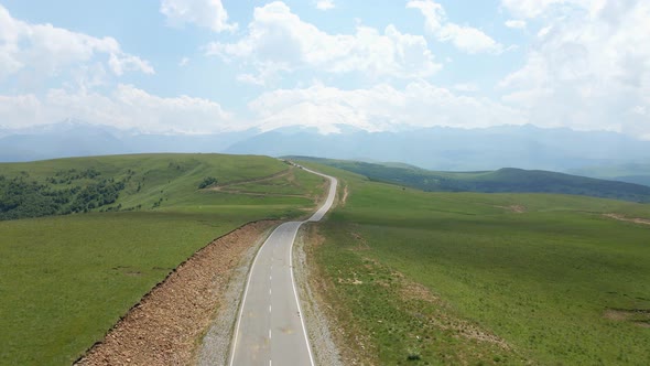 View of the Green Caucasus Mountains in Summer From the Sky