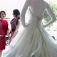 Mother and daughter looking at wedding dress in shop window - VideoHive Item for Sale