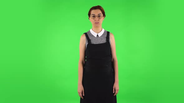 Funny Girl in Round Glasses Frustrated Saying Wow. Green Screen