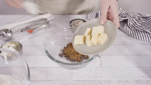 Time lapse. Mixing ingredients to bake chocolate raspberry cupcakes.