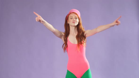 Girl with Long Curly Red Hair and Slim Body Dancing Actively Listening Music, Dressed in 80s Style