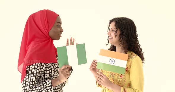 African and Asian Women Together on White Background