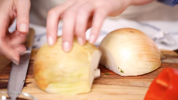 Step by step. Cutting vegetables to make filling for empanadas.