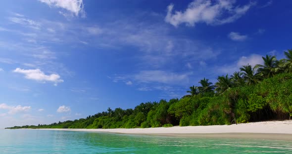 Tropical drone abstract shot of a sandy white paradise beach and blue water background in high resol