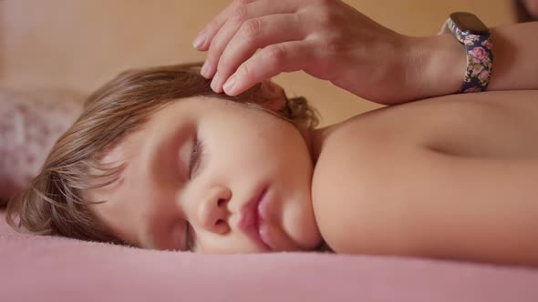 Little Girl Sleep in Her Bed