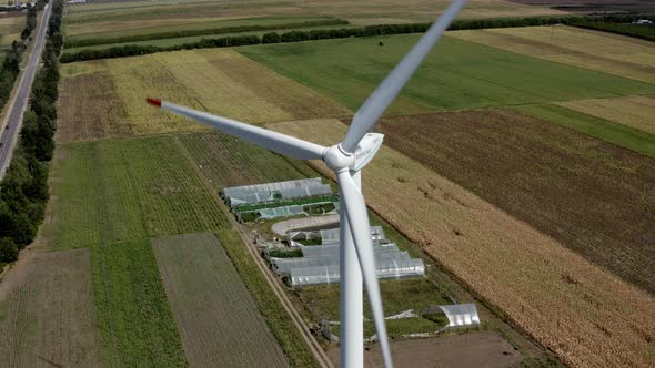 Windmill aerial view in 4K energy production wind power turbine