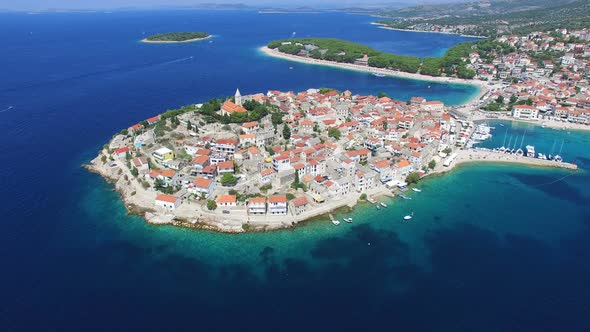 Aerial view of Primosten peninsula with dalmatian islands in the background
