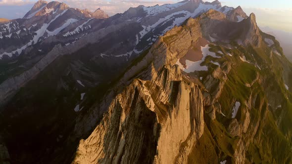 This is a drone shot of schaefler mountain in switzerland. The video is captured around sunset. It i