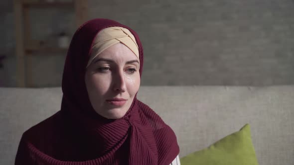 Young Muslim Woman Depression Crying Sitting Couch Living Room Close Up