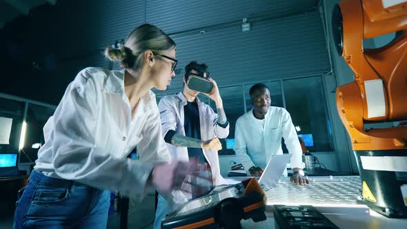 Three Engineers at Robotics Development Laboratory