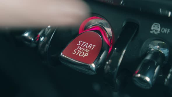 Start Stop Button Is Getting Pushed with a Finger