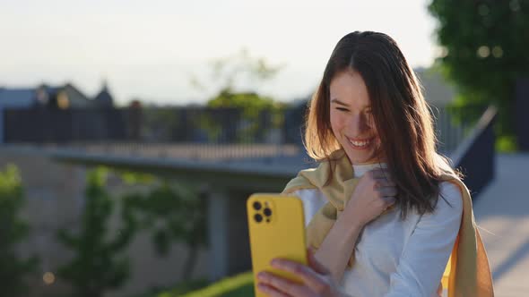 Woman with Hearing Loss Using Smartphone for Video Call