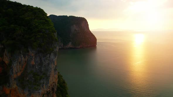 Aerial sunset above mountain silhouette. Beautiful views of the Andaman Sea