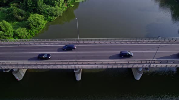 Traffic on the Bridge That Crosses the River