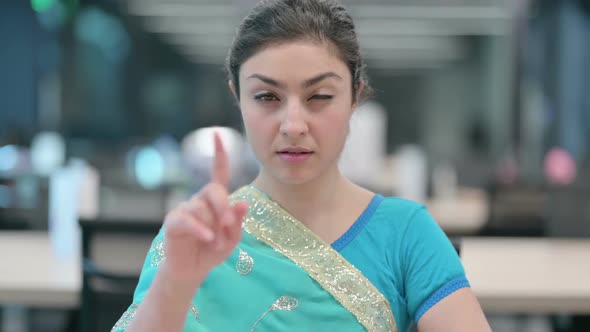 Indian Woman showing No Sign by Finger Sign