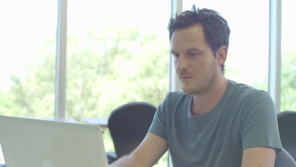 Man using laptop computer