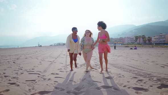 multiethnic young women having fun on the beach