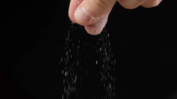 Chef adds salt to the dish, cooking in slow motion, cooking food