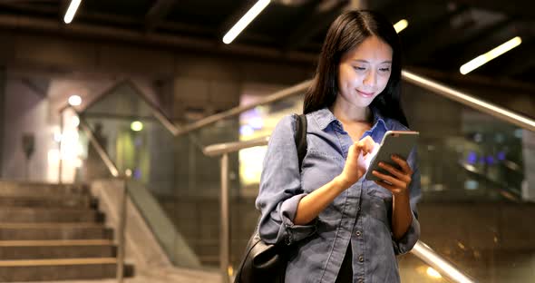 Young Woman Use of Smart Phone in City 