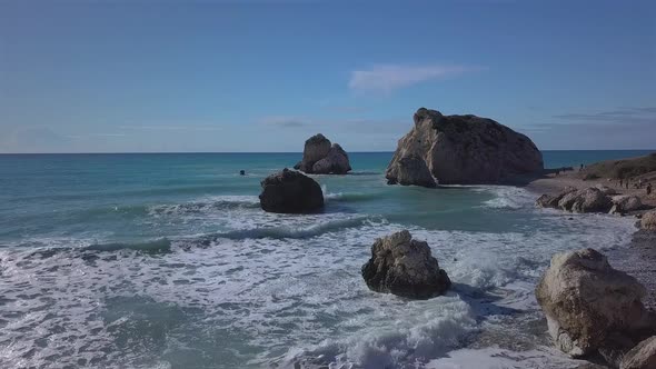 Aerial View of Crashing Waves on Rocks