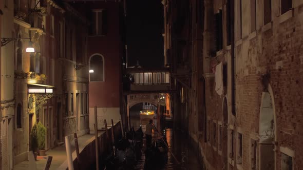 Gondolier with Gondola Boats in Venice Italy