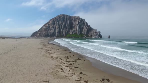 4K Aerial view of Morro Rock and Morro Bay in California USA