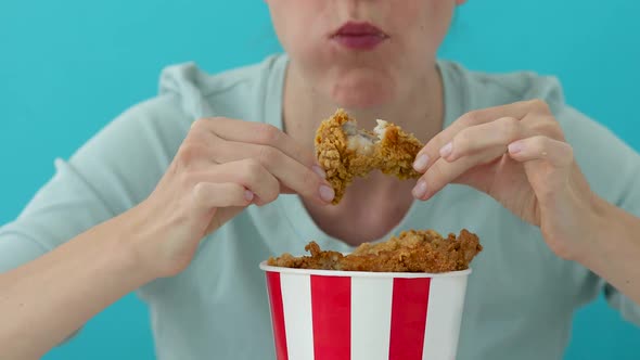 Girl Eating Chicken Wings