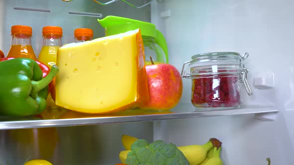 Open Refrigerator Filled with Food