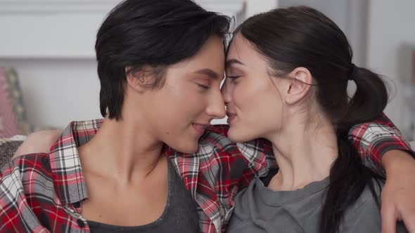 Lesbian Couple in Love Enjoying Moments Together Relaxing at Home