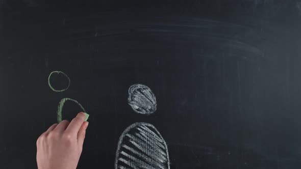 Minimalistic Men are Painted with Colored Chalks Hand on a Chalkboard and are Connected with Dotted