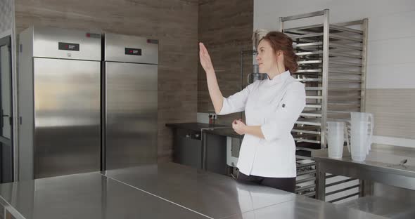 Cookpastry Chef Presses on Touch Screen to Choose Necessary Products for Cooking