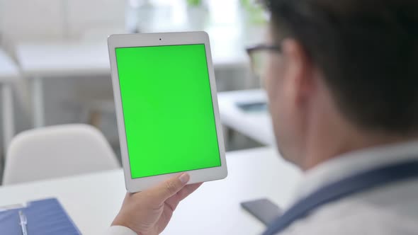 Doctor using Tablet with Green Chroma Screen