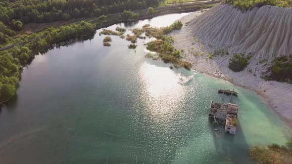 Sand Hills of Quarry With a Pond and Abandoned Prison in Rummu Estonia Europe. Aerial Dron Shoot.