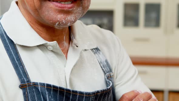 Portrait of happy man standing with arms crossed 4k