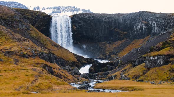 Waterfall in Iceland Untouched Volcanic Landscape Against the Backdrop of Mountains
