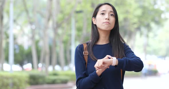 Woman use of smart watch at outdoor