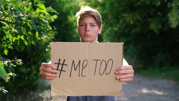 a Young Teenager of Caucasian Ethnicity a Man in a Blue Shirt Holds a Cardboard Box on Outstretched